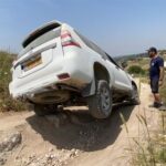 צרעה אתגרי טויוטה לנדקרוזר גלגל באוויר הצלבה